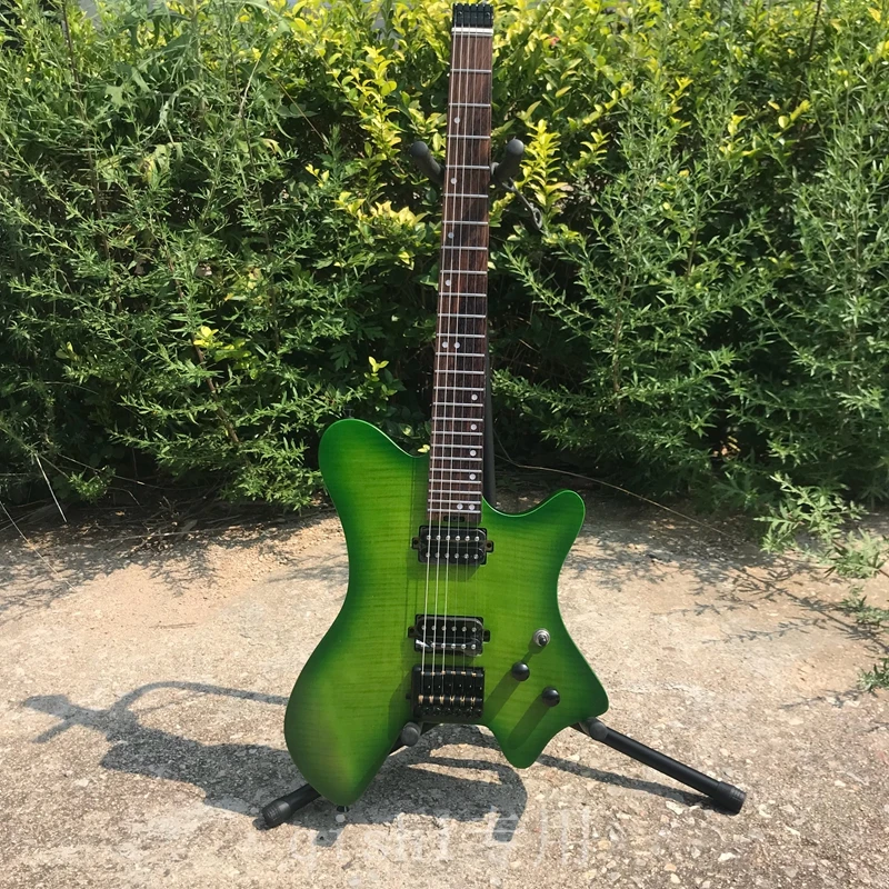 in stock! Portable headless electric guitar, green , 5-necked, American ASH body, round head stainless steel wire, free shipping
in stock! Portable headless electric guitar, green , 5-necked, American ASH body, round head stainless steel wire, free shipping