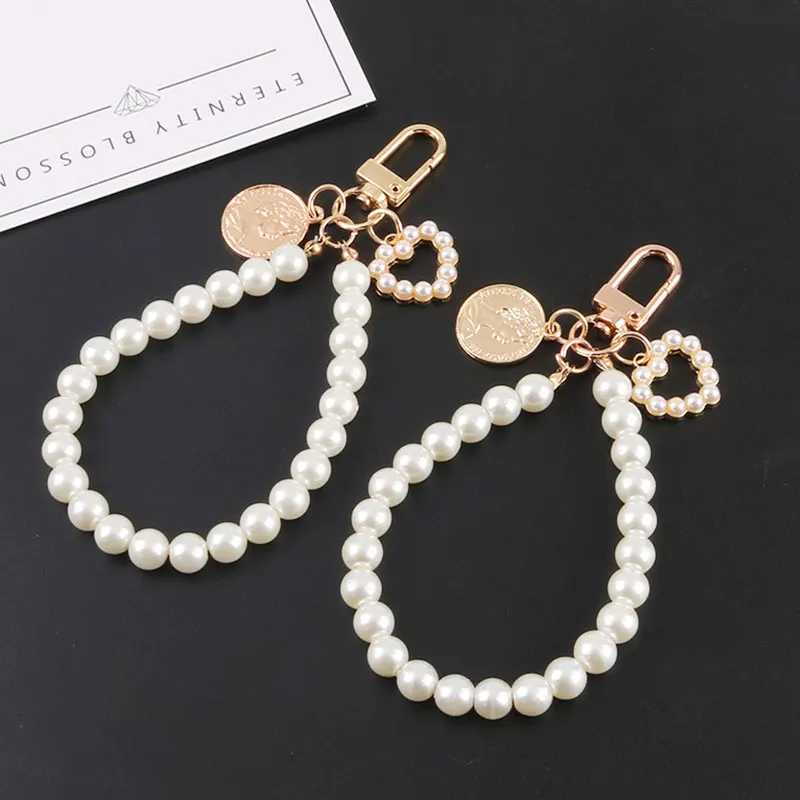 Imitation Pearl Lanyard Keychain Antique Cloud Animal Alloy Key Ring Women Girl Airpods Bag Key Chains Ornament
Imitation Pearl Lanyard Keychain Antique Cloud Animal Alloy Key Ring Women Girl Airpods Bag Key Chains Ornament