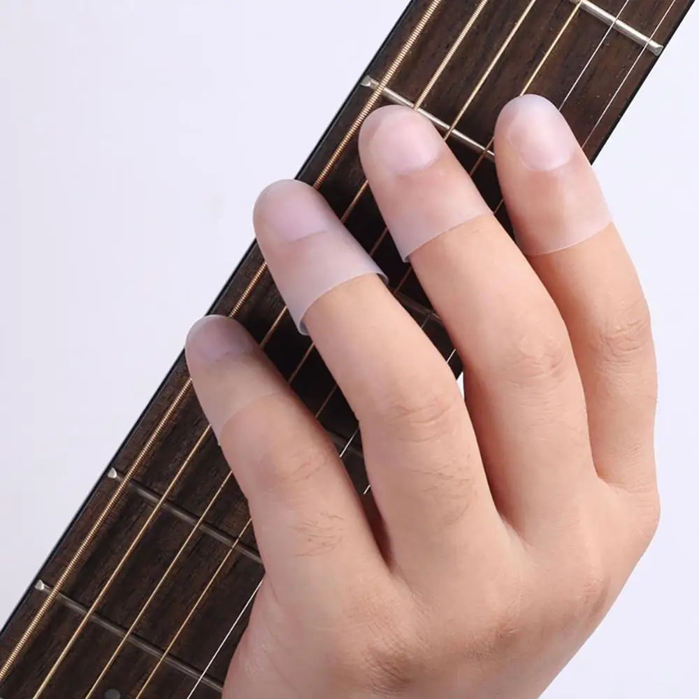 4Pcs Ultra-thin Left Hand Guitar Fingertip Protector Silicone Finger Guard Cover
4Pcs Ultra-thin Left Hand Guitar Fingertip Protector Silicone Finger Guard Cover