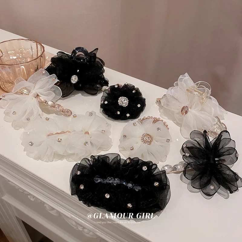 Rococo style diamond-encrusted organza series bow hairpin grab clip French fashion temperament super fairy edge clip headdress
Rococo style diamond-encrusted organza series bow hairpin grab clip French fashion temperament super fairy edge clip headdress