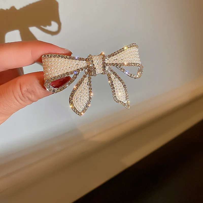 2021 New Ins Korean Fashion Temperament Pearl Diamond Bow Spring Hair Clip For Women Jewelry Gifts Hair Accessories For Women
2021 New Ins Korean Fashion Temperament Pearl Diamond Bow Spring Hair Clip For Women Jewelry Gifts Hair Accessories For Women