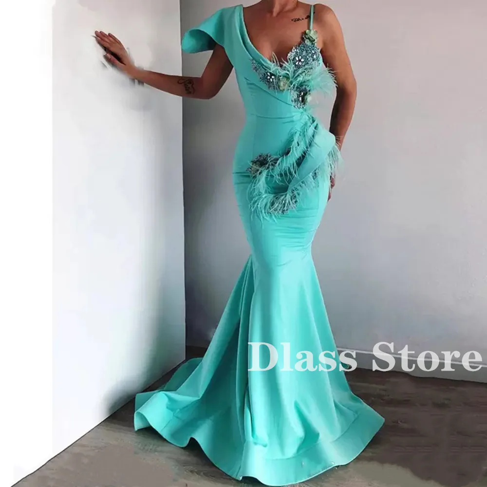 

Turquoise Spaghetti Evening Dress Luxury Mermaid V-neck Feather Crystals Satin Saudi Arabic Formal Prom Party Gown فساتين طويلة