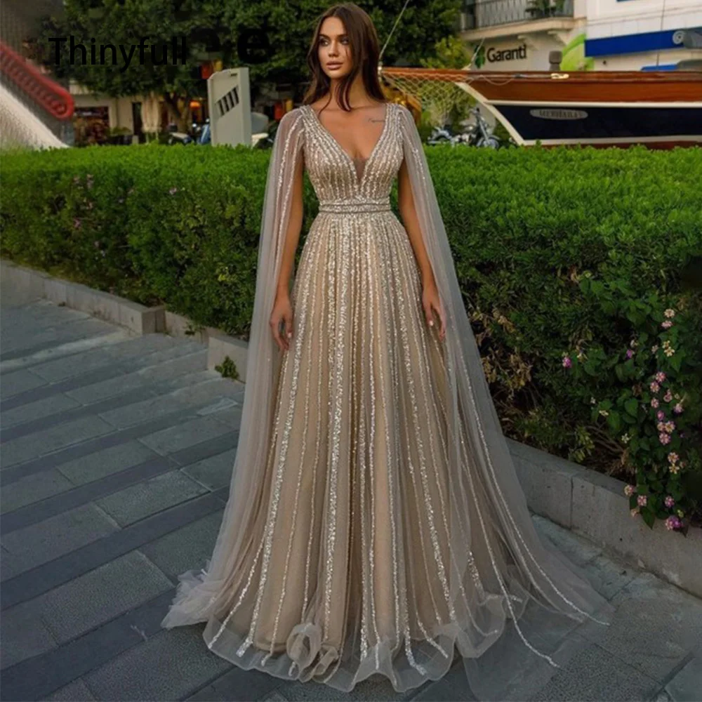Thinyfull A Line Shinning V Neck Evening Dresses For Wedding Party Long Luxury 2023 Sequined Formal Prom Dress Dubai Party Gown
Thinyfull A Line Shinning V Neck Evening Dresses For Wedding Party Long Luxury 2023 Sequined Formal Prom Dress Dubai Party Gown