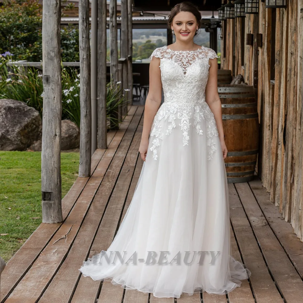 

Anna Vintage Jewel Neck Wedding Dress New 2023 A Line Lace Appliques Illusion with Button Cap Sleeveless Tulle Vestidos De Novia