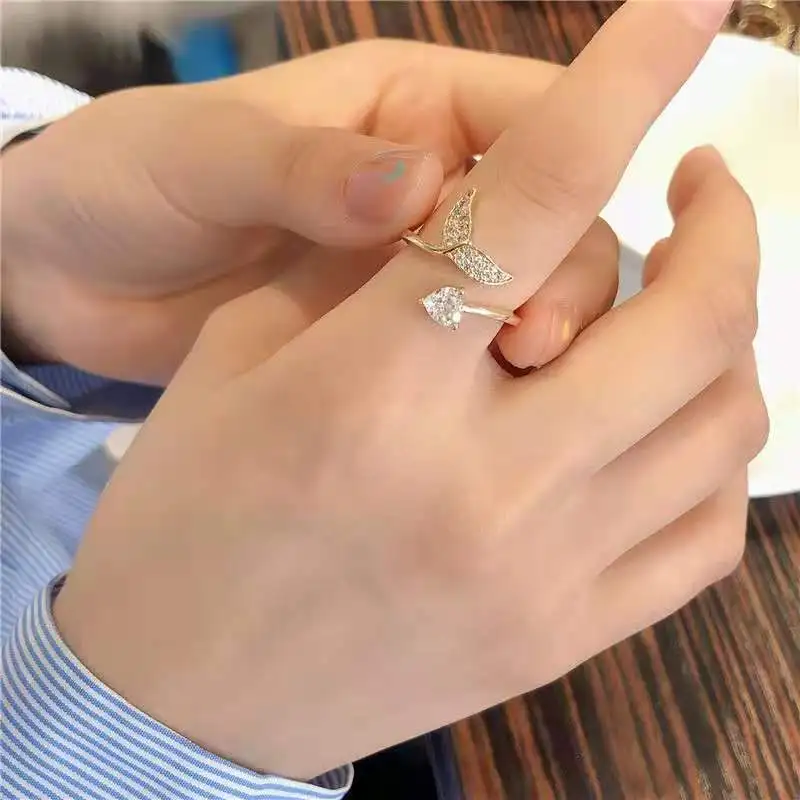 Creative European and American New Mermaid Tail Inlaid Zirconium Ring Ins Original Design Light Luxury Advanced Ring
Creative European and American New Mermaid Tail Inlaid Zirconium Ring Ins Original Design Light Luxury Advanced Ring