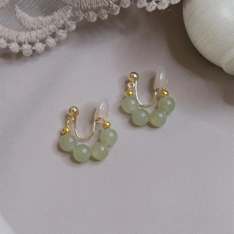 Minar Chinese Style Green Color Hetian Jade Natural Stone Clip Earrings for Women Gold Color Copper Beads Round Circle Ear Cuff
Minar Chinese Style Green Color Hetian Jade Natural Stone Clip Earrings for Women Gold Color Copper Beads Round Circle Ear Cuff