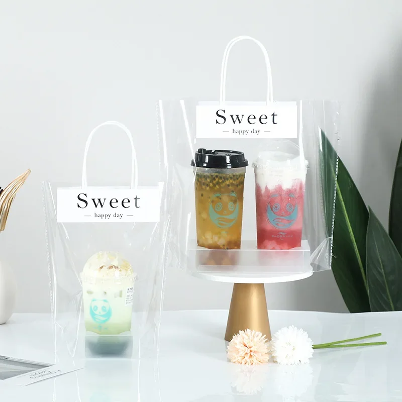 Handle Drinking Bags Sweet Clear Plastic Packaging Drinks Bags Cup Carriers for Drinks Coffee Restaurant Bar Hold 1 or 2 Cups
Handle Drinking Bags Sweet Clear Plastic Packaging Drinks Bags Cup Carriers for Drinks Coffee Restaurant Bar Hold 1 or 2 Cups