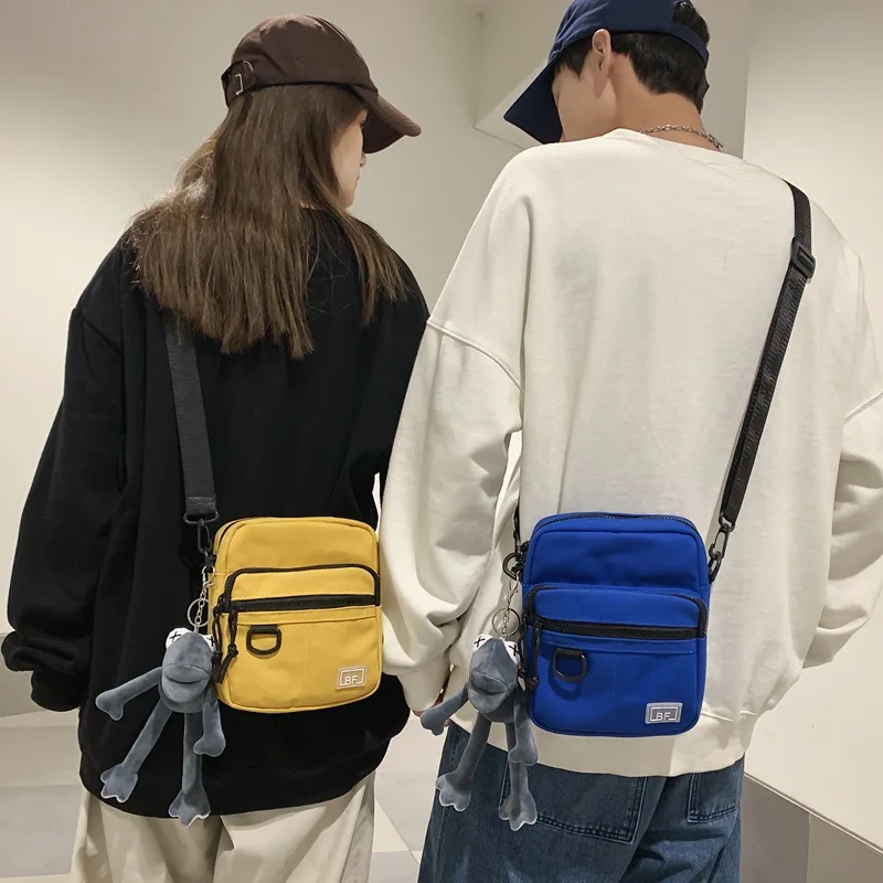 Women Men Shoulder Messenger Bag Small Canvas Crossbody Bags for Girl 2023 New Japanese Student Handbag Mini Phone Purse Flap 가방
Women Men Shoulder Messenger Bag Small Canvas Crossbody Bags for Girl 2023 New Japanese Student Handbag Mini Phone Purse Flap 가방