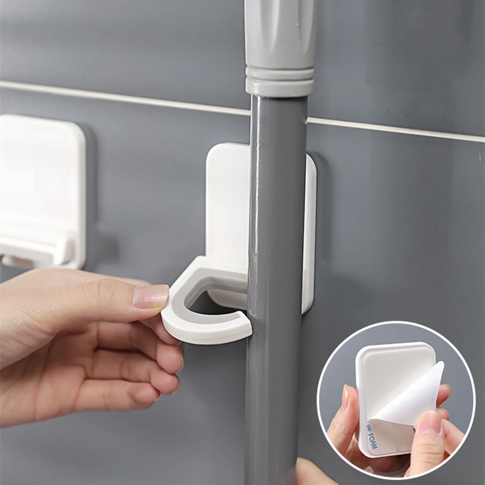 Wall Mounted Mop Broom Holder Multipurpose Adhesive Hanger Bathroom Storage Rack Hooks Waterproof Wall Hook Kitchen Storage Tool
Wall Mounted Mop Broom Holder Multipurpose Adhesive Hanger Bathroom Storage Rack Hooks Waterproof Wall Hook Kitchen Storage Tool