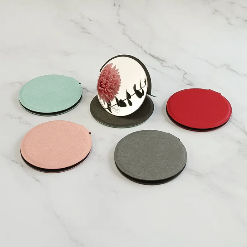 Round Mini Portable Hand Pocket Cosmetic Mirror Stainless Steel Unbreakable Metal Ultra-thin Cosmetic Mirror with PU Storage Bag
Round Mini Portable Hand Pocket Cosmetic Mirror Stainless Steel Unbreakable Metal Ultra-thin Cosmetic Mirror with PU Storage Bag