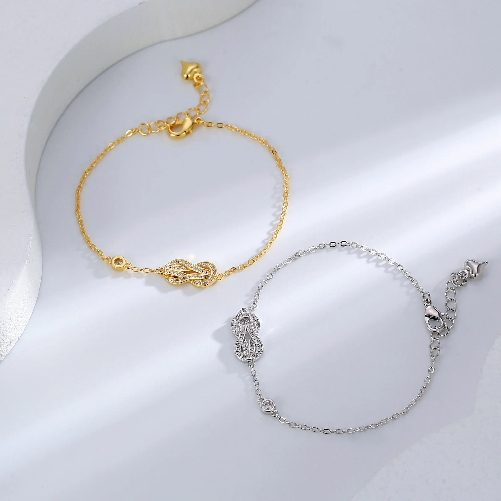 18K gold plated trendy thin crystal chain cubic zirconia lucky number eight women fashion adjustable bracelet
18K gold plated trendy thin crystal chain cubic zirconia lucky number eight women fashion adjustable bracelet