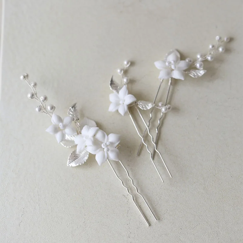 SLBRIDAL Handmade Alloy Leaf Ceramic Flower Pearls Bridal Hair Pins Set Wedding Hair Sticker Hair Accessories Women Hair Jewelry
SLBRIDAL Handmade Alloy Leaf Ceramic Flower Pearls Bridal Hair Pins Set Wedding Hair Sticker Hair Accessories Women Hair Jewelry