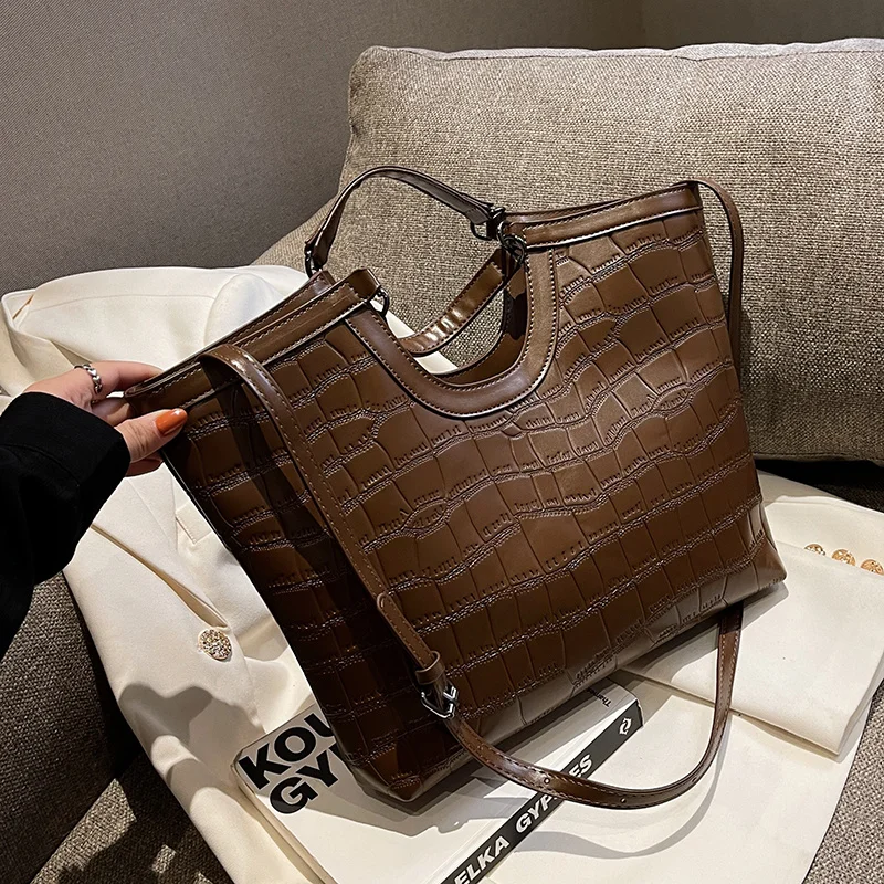 Новая модная кожаная сумка-тоут с каменным узором для женщин 2022, женская простая вместительная сумка через плечо с боковыми ручками
Новая модная кожаная сумка-тоут с каменным узором для женщин 2022, женская простая вместительная сумка через плечо с боковыми ручками