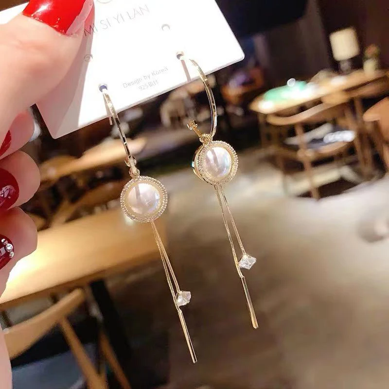Round Pearl Pendant Long Tassel Women's Earrings Vintage Fashion Stud Earrings Fashion Simple Trend Women Jewelry
Round Pearl Pendant Long Tassel Women's Earrings Vintage Fashion Stud Earrings Fashion Simple Trend Women Jewelry