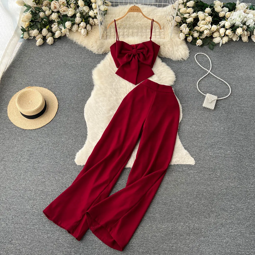 Summer Solid Color Fashion Bow Tie Halter Tops Open Wide Leg Casual Pants Two-piece Set
Summer Solid Color Fashion Bow Tie Halter Tops Open Wide Leg Casual Pants Two-piece Set