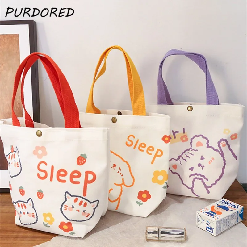 PURDORED 1 Pc Women Cartoon Mini Handbag Fashion Korean Style Small Shopping Bag for Girl Fresh Reusable Canvas Storage Tote Bag
PURDORED 1 Pc Women Cartoon Mini Handbag Fashion Korean Style Small Shopping Bag for Girl Fresh Reusable Canvas Storage Tote Bag