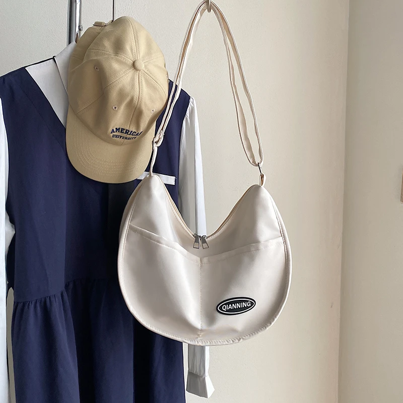 Summer New Women's Bag Large Capacity Casual Nylon Crossbody Bag Dumpling Bag High Grade Solid Color Shoulder Bag
Summer New Women's Bag Large Capacity Casual Nylon Crossbody Bag Dumpling Bag High Grade Solid Color Shoulder Bag