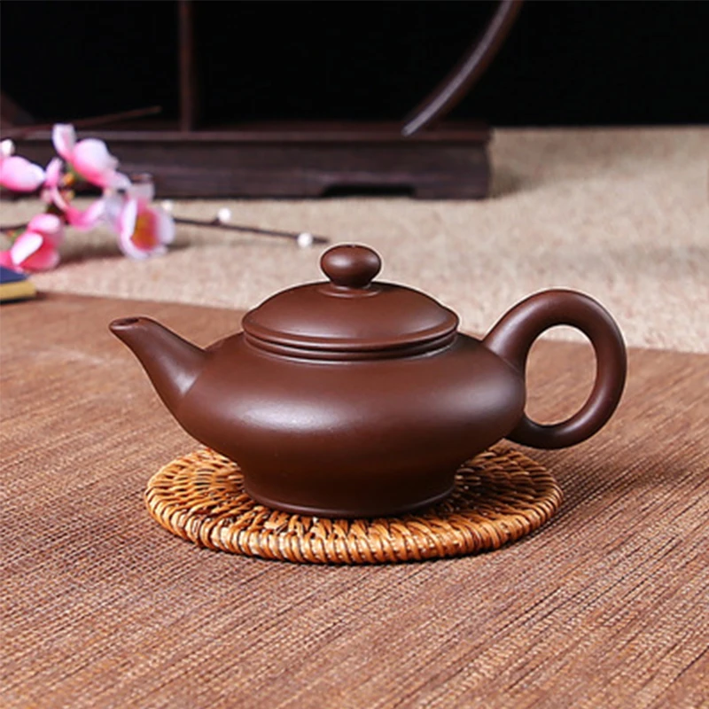 Yixing Purple Clay Pot Pure Handmade Small Teapot Washing Can Filter Teapot Kung Fu Tea Set Chinese Tea Ceremony Drinking Set
Yixing Purple Clay Pot Pure Handmade Small Teapot Washing Can Filter Teapot Kung Fu Tea Set Chinese Tea Ceremony Drinking Set