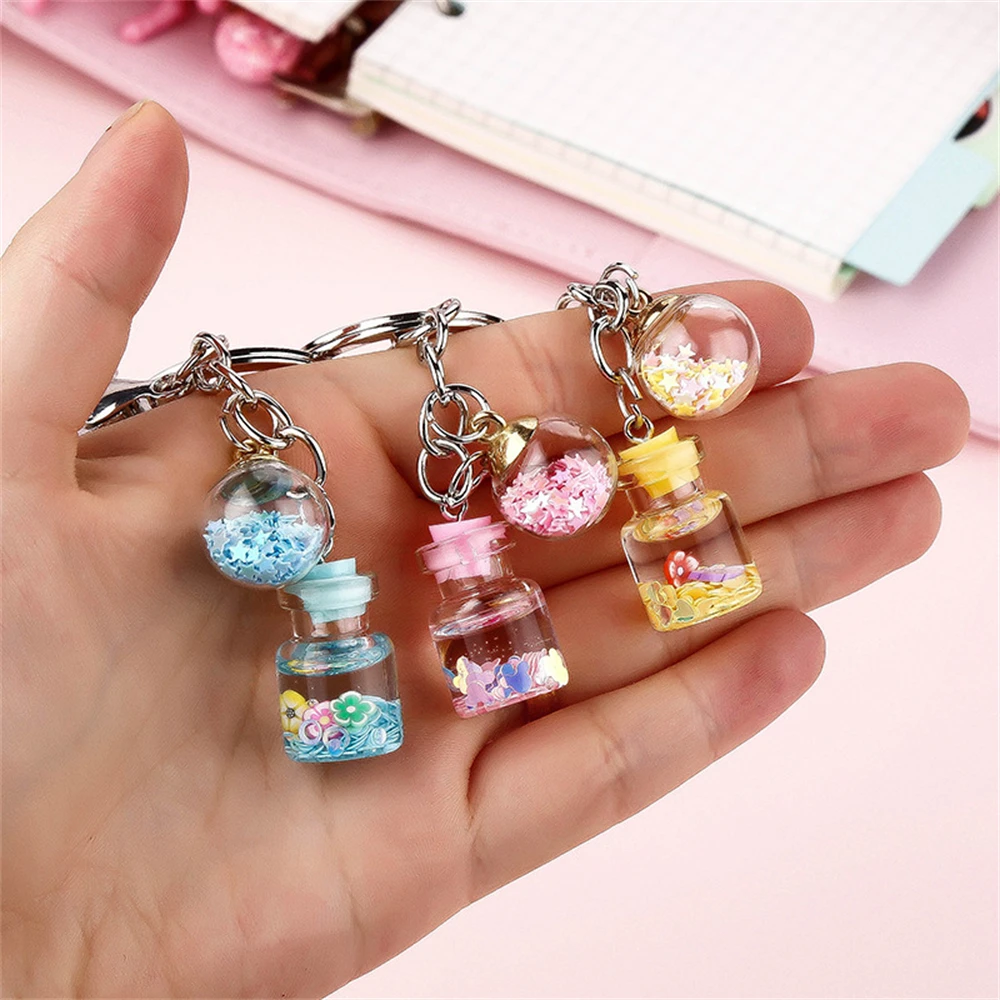 Charm Flower Star Quicksand Bottle Keychain For Women Girl Cute Silver Plated Bag Car Key Rings Jewelry Accessories
Charm Flower Star Quicksand Bottle Keychain For Women Girl Cute Silver Plated Bag Car Key Rings Jewelry Accessories