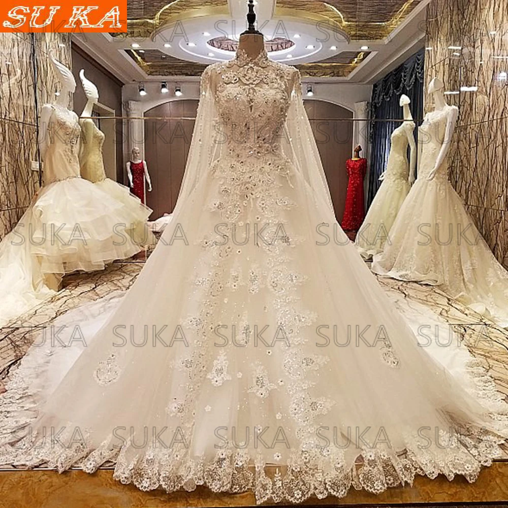 Luxury Pearls Lace Wedding Dress With Cape Vintage Dress Tulle Sexy Princess Plus Size Bridal Dress vestidos de boda invitada
Luxury Pearls Lace Wedding Dress With Cape Vintage Dress Tulle Sexy Princess Plus Size Bridal Dress vestidos de boda invitada