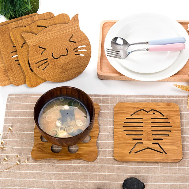 Cartoon hollow wooden coasters kitchen tableware thickened hot insulation mat wooden non-slip pots and pans mat table mat
Cartoon hollow wooden coasters kitchen tableware thickened hot insulation mat wooden non-slip pots and pans mat table mat