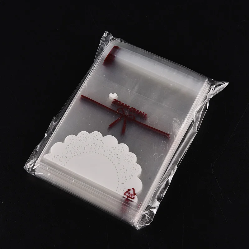 100pcs Lovely lace bow Print Gifts Bags Christmas packaging self-adhesive plastic bags Candy Cake package Stationery Holder
100pcs Lovely lace bow Print Gifts Bags Christmas packaging self-adhesive plastic bags Candy Cake package Stationery Holder