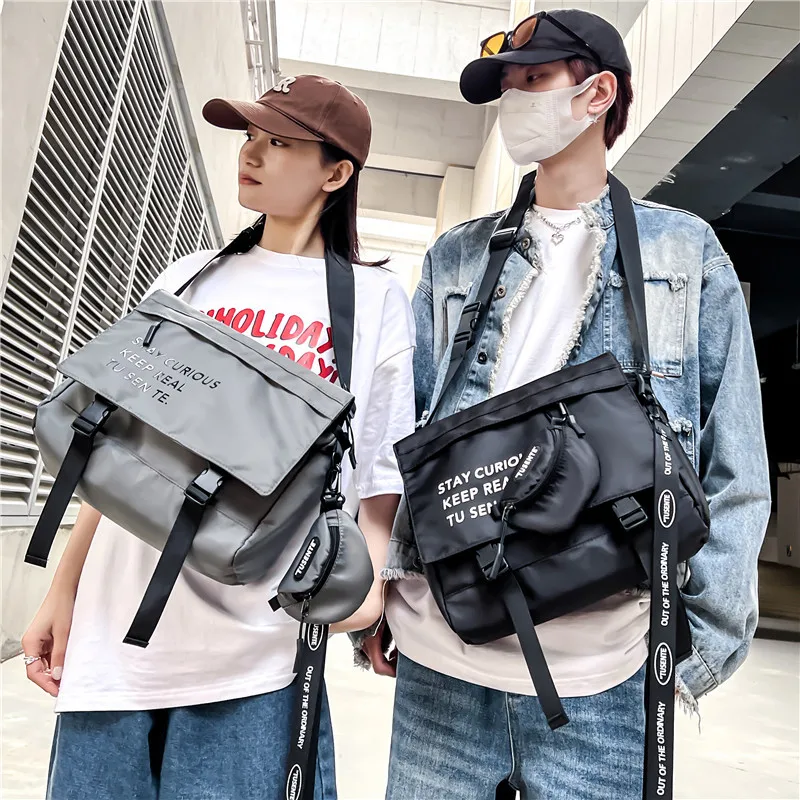 Новая вместительная сумка почтальона для пары, модная брендовая сумка через плечо для инструментов для мужчин и женщин, повседневная Студе... 
Новая вместительная сумка почтальона для пары, модная брендовая сумка через плечо для инструментов для мужчин и женщин, повседневная Студе...