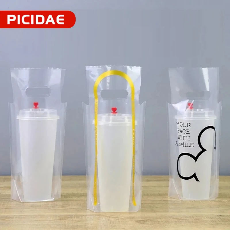 100Pcs Milk Tea Handle Bags Fruit Juice Coffee Coke Tote Drink Bag Disposable Single Double Cup Portable Fresh Plastic Packaging
100Pcs Milk Tea Handle Bags Fruit Juice Coffee Coke Tote Drink Bag Disposable Single Double Cup Portable Fresh Plastic Packaging