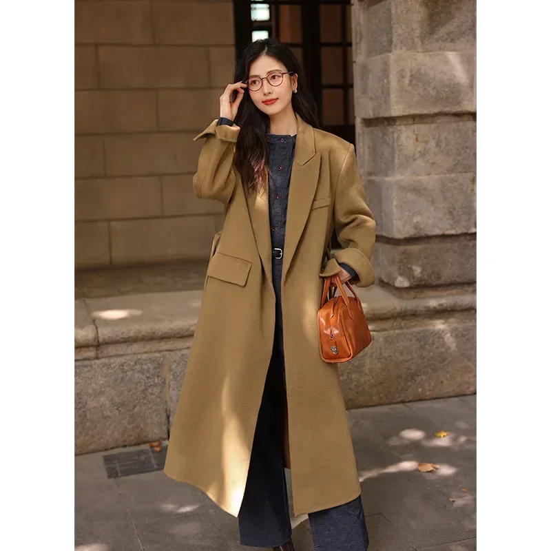 Shoulder padded 100% sheep wool double-sided woolen coat women's 2023 autumn/winter new camel colored tie up for slimming effect
Shoulder padded 100% sheep wool double-sided woolen coat women's 2023 autumn/winter new camel colored tie up for slimming effect