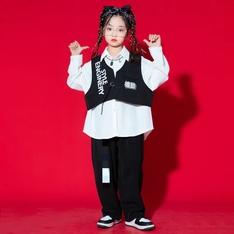 Детская одежда в стиле K-POP, рубашка большого размера, топ, жилет, свободная повседневная Уличная одежда, мешковатые брюки для девочек и мальчиков, костюм для джазовых танцев, одежда
Детская одежда в стиле K-POP, рубашка большого размера, топ, жилет, свободная повседневная Уличная одежда, мешковатые брюки для девочек и мальчиков, костюм для джазовых танцев, одежда