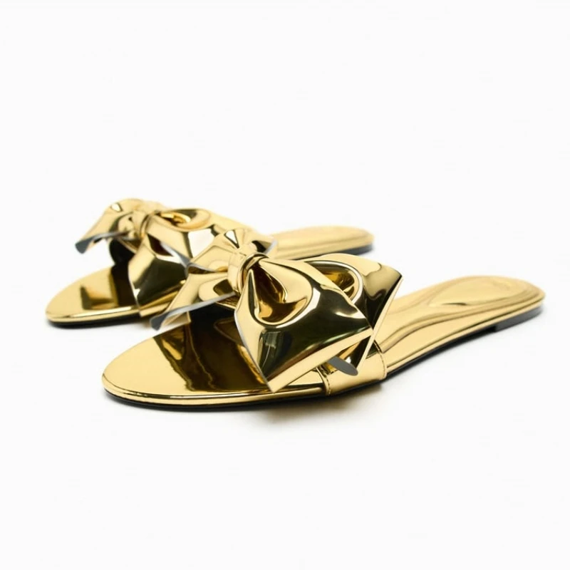 2023 ZAZA Women Bow Flats Sandals Summer Sexy Gold Leather Slides Casual Outdoor Slippers Female Fashion Beach Sandals
2023 ZAZA Women Bow Flats Sandals Summer Sexy Gold Leather Slides Casual Outdoor Slippers Female Fashion Beach Sandals