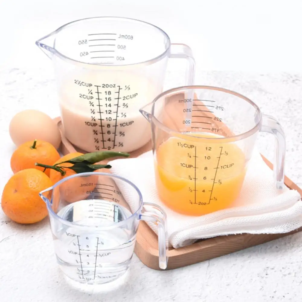 150/300/600ml Handle Water Milk Egg Scale Measuring Cup Mug Measurement Jugs Kitchen Baking Tools
150/300/600ml Handle Water Milk Egg Scale Measuring Cup Mug Measurement Jugs Kitchen Baking Tools