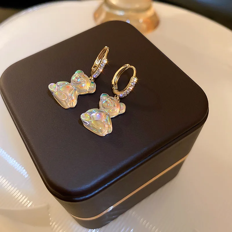 South Korea's Sweet, Lovely And Adorable Design Sense Of Micro-inlaid Zircon Super Flash Acrylic Bear Girl Earrings
South Korea's Sweet, Lovely And Adorable Design Sense Of Micro-inlaid Zircon Super Flash Acrylic Bear Girl Earrings
