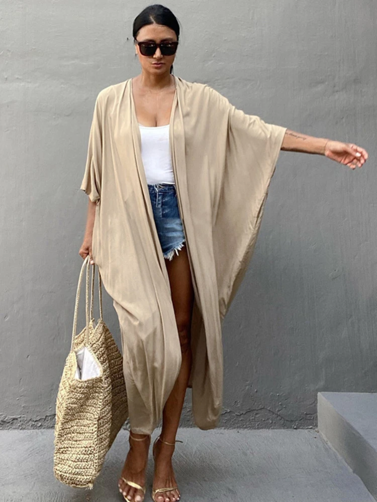 Beach Cover Up Kimono Women Summer 2022 New Pareo Swimsuit Cape Solid Bohemian Tunic Dresses Bathing Suits Dropshipping
Beach Cover Up Kimono Women Summer 2022 New Pareo Swimsuit Cape Solid Bohemian Tunic Dresses Bathing Suits Dropshipping