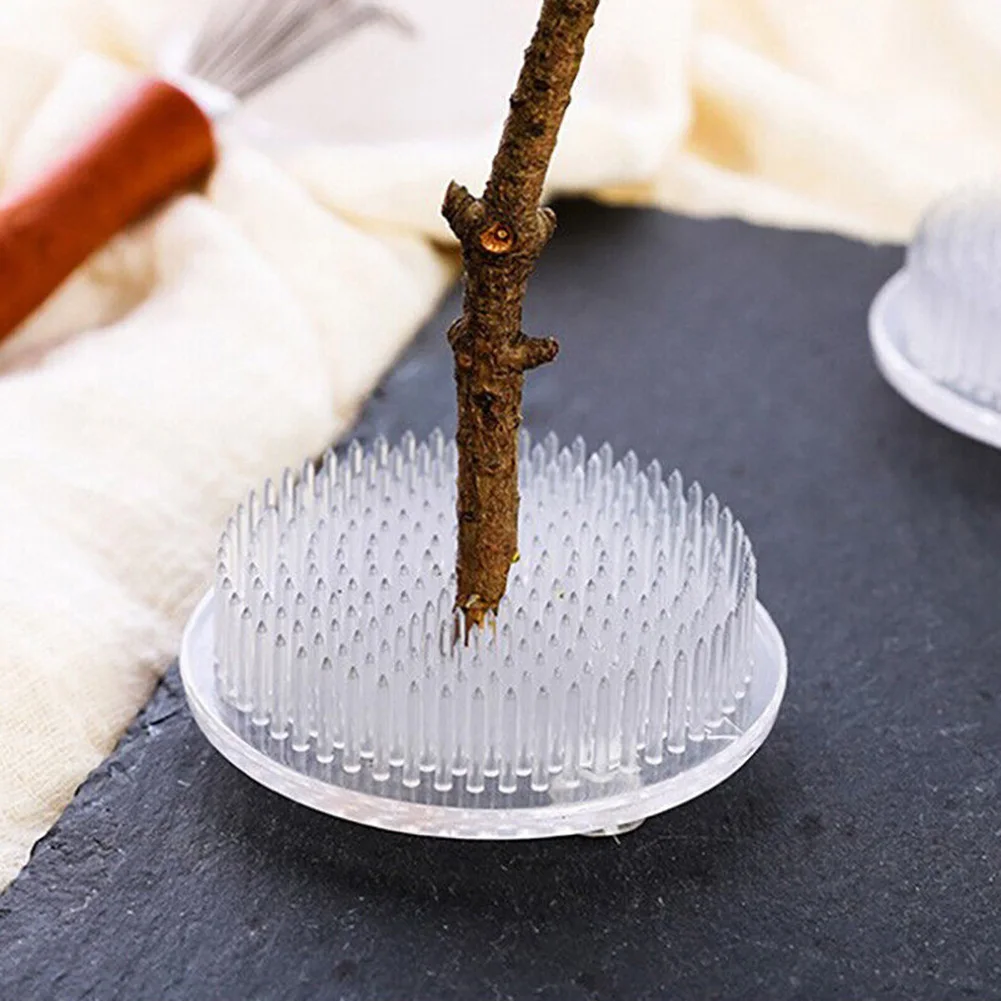 Round Flower Base Holder Floral Frog Pin Needles Spiky Frog Fixed Tool Ikebana Arrangement Floral Decor
Round Flower Base Holder Floral Frog Pin Needles Spiky Frog Fixed Tool Ikebana Arrangement Floral Decor