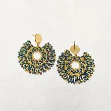 Rice bead earrings Sunflower Dazzling Hollow out Tide Retro Simple Hand knitting Bohemia Alloy Crystal Roundness Beaded earrings