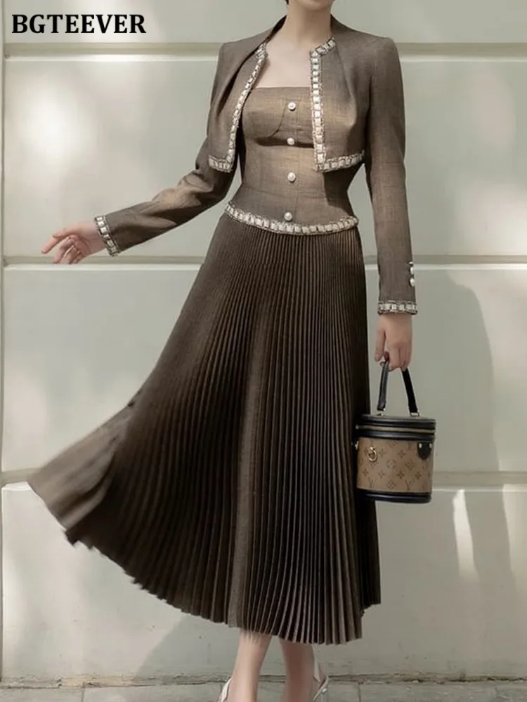 BGTEEVER Spring Slim Ladies Skirt Set Long Sleeve Blazer & Sleeveless Buttons Pleated Dress Women Elegant Ladies Outfits
BGTEEVER Spring Slim Ladies Skirt Set Long Sleeve Blazer & Sleeveless Buttons Pleated Dress Women Elegant Ladies Outfits