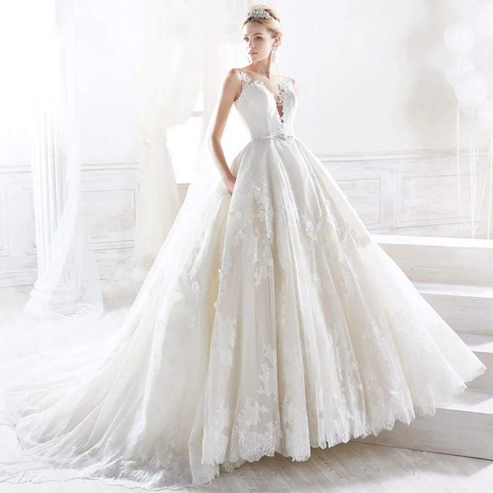 White V-Neck Bridal Wedding Dress Sleeveless Lace Appliqué Luxurious Sexy Ladies Tulle Open Back Illusion Button Vestido De Noiv
White V-Neck Bridal Wedding Dress Sleeveless Lace Appliqué Luxurious Sexy Ladies Tulle Open Back Illusion Button Vestido De Noiv