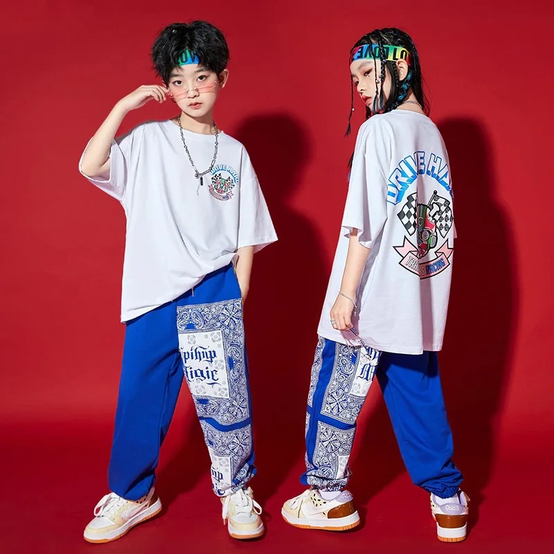 Новинка, летняя детская одежда в стиле K-POP, хип-хоп, модная повседневная хлопковая Футболка с принтом для мальчиков, брюки-джоггеры для девочек, костюм для джазовых танцев
Новинка, летняя детская одежда в стиле K-POP, хип-хоп, модная повседневная хлопковая Футболка с принтом для мальчиков, брюки-джоггеры для девочек, костюм для джазовых танцев