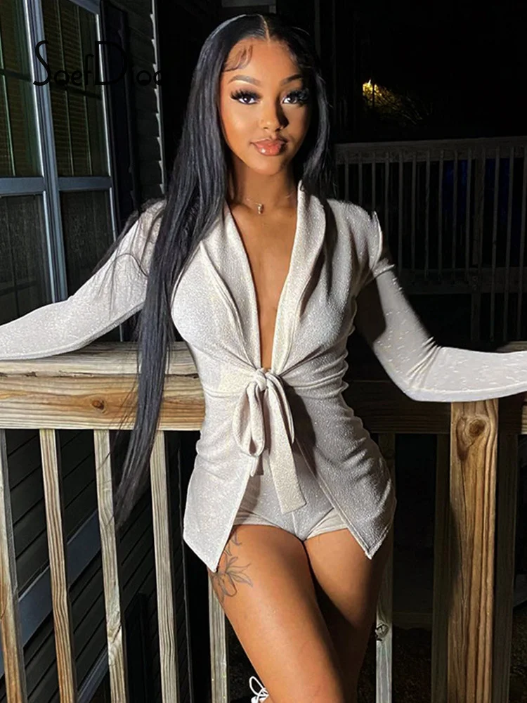 Soefdioo Shiny Two Piece Set Women Sexy Deep V Long Sleeve Lace Up Tops and Tight Shorts Matching Autumn 2022 Party Club Outfits 
Soefdioo Shiny Two Piece Set Women Sexy Deep V Long Sleeve Lace Up Tops and Tight Shorts Matching Autumn 2022 Party Club Outfits