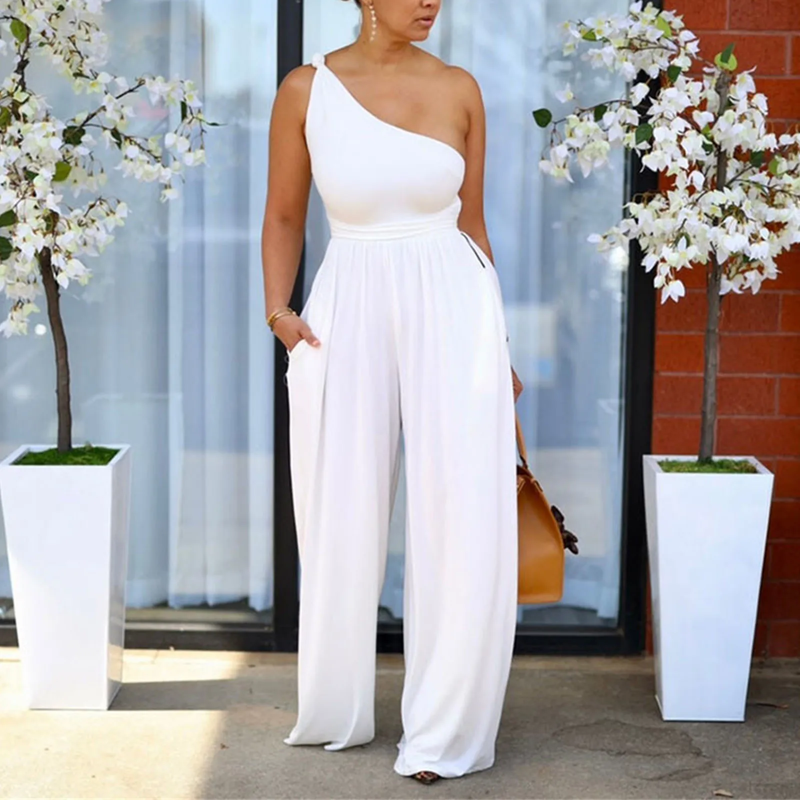 Women's Sleeveless Solid Color Fashion Vest Romper With Vintage Loose Fit Pants Suit
Women's Sleeveless Solid Color Fashion Vest Romper With Vintage Loose Fit Pants Suit