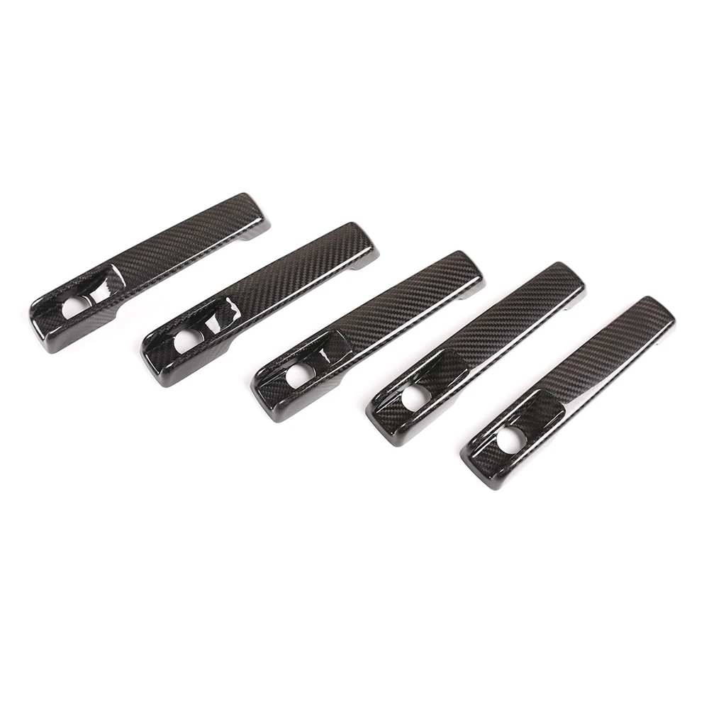Автомобильная наружная дверная ручка из настоящего углеродного волокна, Накладка для Mercedes Benz G класса W463 G350 G400 G500 2019-2020
Автомобильная наружная дверная ручка из настоящего углеродного волокна, Накладка для Mercedes Benz G класса W463 G350 G400 G500 2019-2020