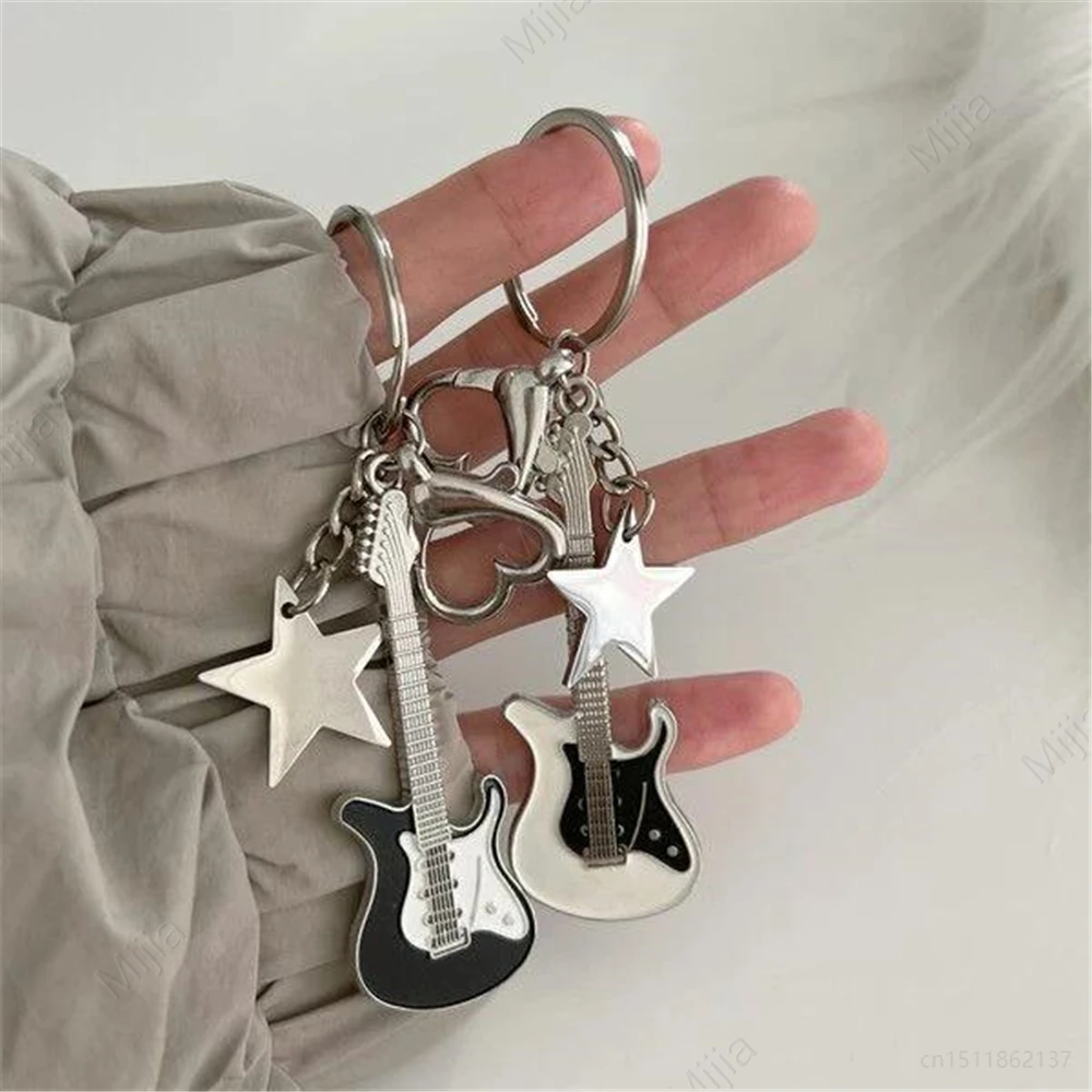 4 Colors Mini Cute Guitar Love Heart Star Keychain for Women Men Cool Car Key Chain Bag Pendant Vintage Aesthetic Y2k Accessory
4 Colors Mini Cute Guitar Love Heart Star Keychain for Women Men Cool Car Key Chain Bag Pendant Vintage Aesthetic Y2k Accessory