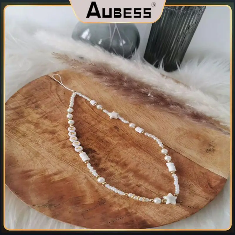 Durable Simple Shell Five-pointed Star Mobile Phone Fashion Pearl Decoration Portable Beautiful Natural Letters Lanyard
Durable Simple Shell Five-pointed Star Mobile Phone Fashion Pearl Decoration Portable Beautiful Natural Letters Lanyard