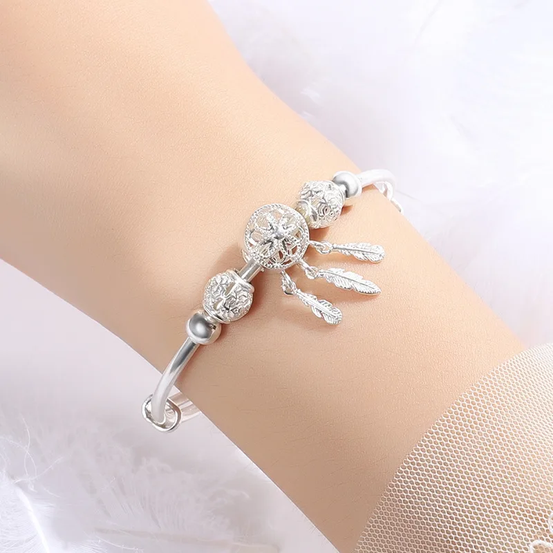 S999 Sterling Silver Bracelet Ladies Tassel Push Pull Feather Dream Catcher Bracelet Ladies Luxury Adjustable Bracelet Wholesale
S999 Sterling Silver Bracelet Ladies Tassel Push Pull Feather Dream Catcher Bracelet Ladies Luxury Adjustable Bracelet Wholesale