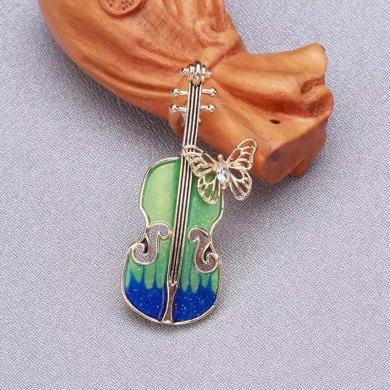 Shining Crystal Enamel Guitar Butterfly Brooch Ladies Music Party Exquisite Elegant Dress Accessory
Shining Crystal Enamel Guitar Butterfly Brooch Ladies Music Party Exquisite Elegant Dress Accessory