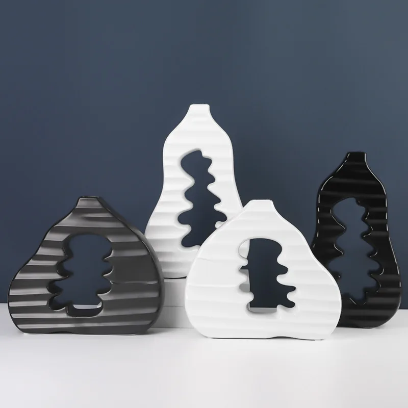 Abstract Handicraft Vase High-grade Ceramic Hollow Flower Arrangement Black White Handicraft Flower Vase Home Decoration Gifts
Abstract Handicraft Vase High-grade Ceramic Hollow Flower Arrangement Black White Handicraft Flower Vase Home Decoration Gifts