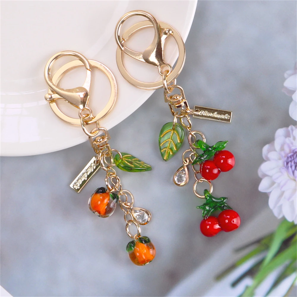 Cute Cherry Car Key Ring Persimmon Leaf Creative Gift Ornaments Simulation Food Games Airpods Bag Accessories Keychain
Cute Cherry Car Key Ring Persimmon Leaf Creative Gift Ornaments Simulation Food Games Airpods Bag Accessories Keychain