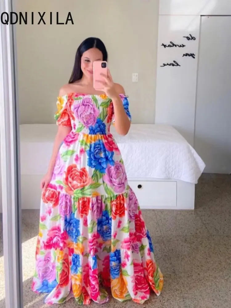 Платье-макси с открытыми плечами, радужным цветочным принтом и бабочкой
Платье-макси с открытыми плечами, радужным цветочным принтом и бабочкой