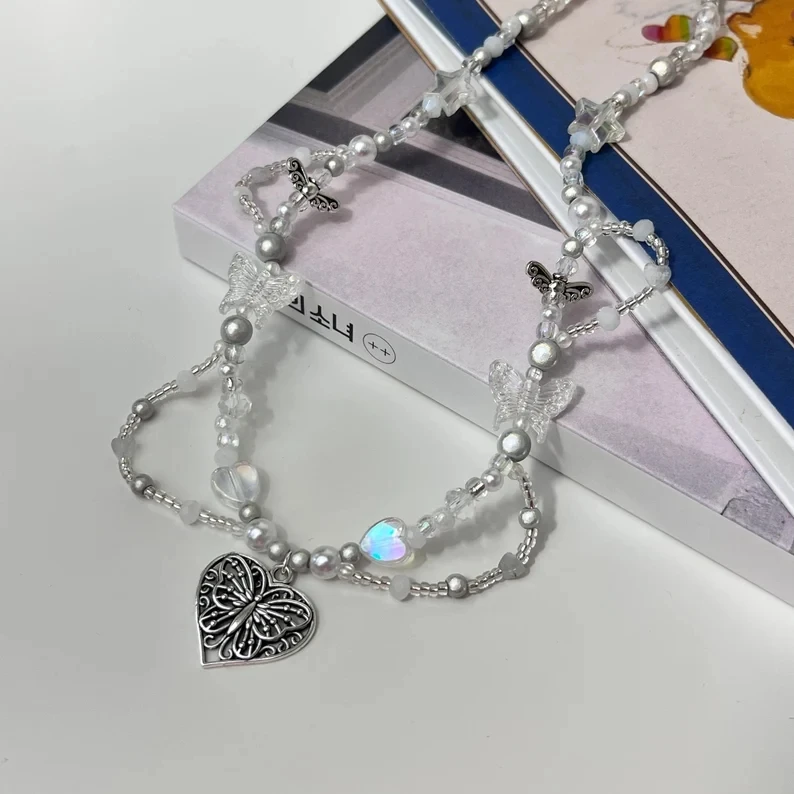 Icy Fairy Heart Butterfly beaded choker White silver bead necklace Statement Pearl Heart Perfect gift girlfriend best friend
Icy Fairy Heart Butterfly beaded choker White silver bead necklace Statement Pearl Heart Perfect gift girlfriend best friend